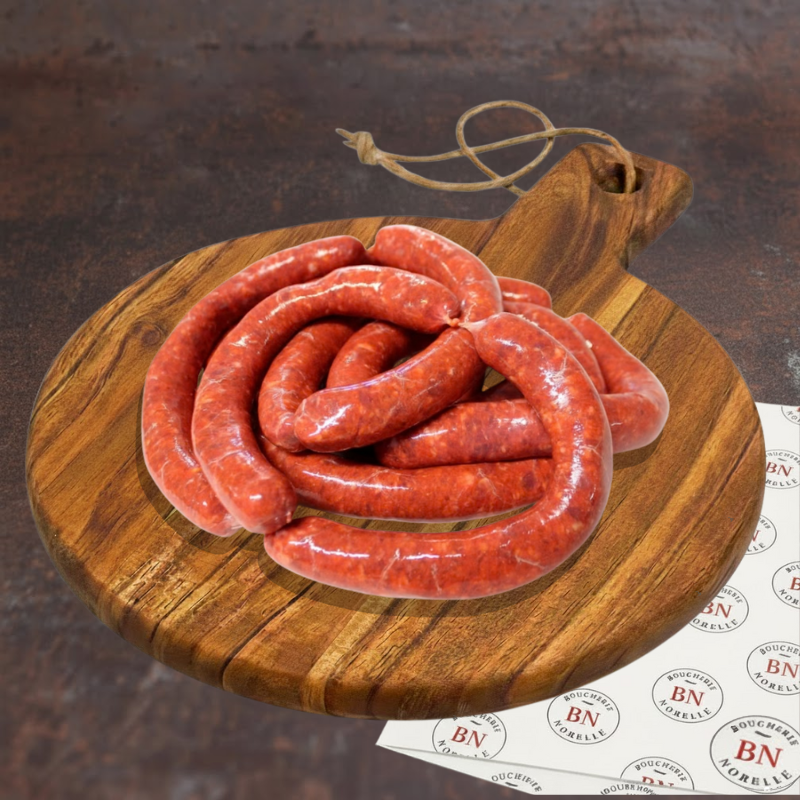 Merguez présentées sur une planche